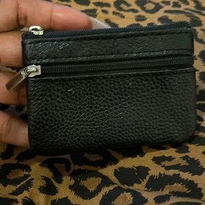 Unisex change purse.